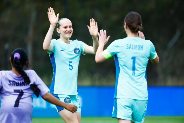 Tamsin Colley (L) and Carly Salmon (R) of the ParaMatildas hi-five after a goal against Nepal (game 2), IFCPF Asia Oceania Championships